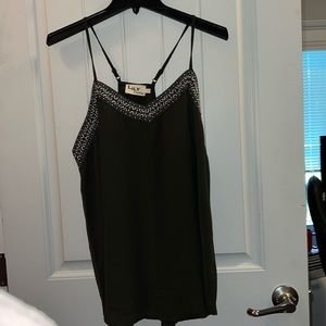 Lily clothing with green and black trim. No holes or stains